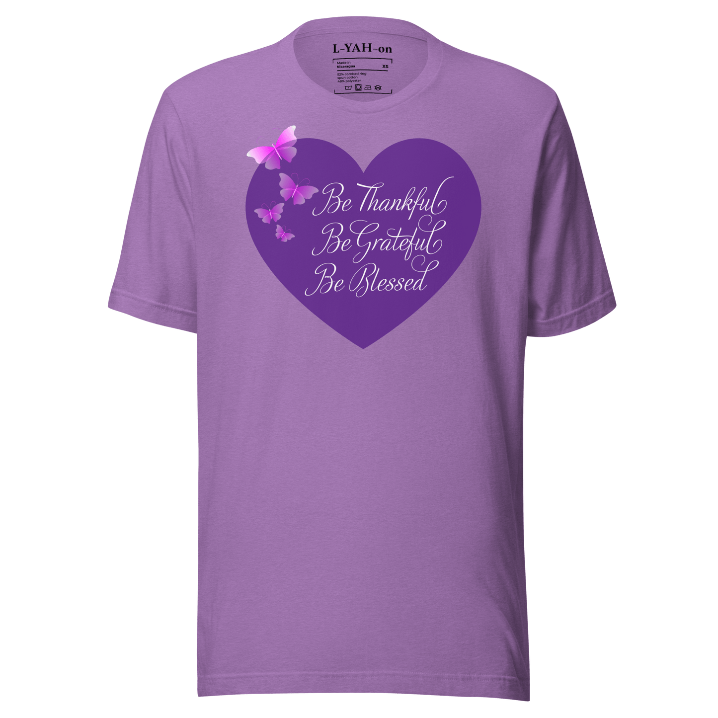 A purple t-shirt with a heart-shaped design containing the words 'Be Thankful, Be Grateful, Be Blessed' surrounded by butterflies.