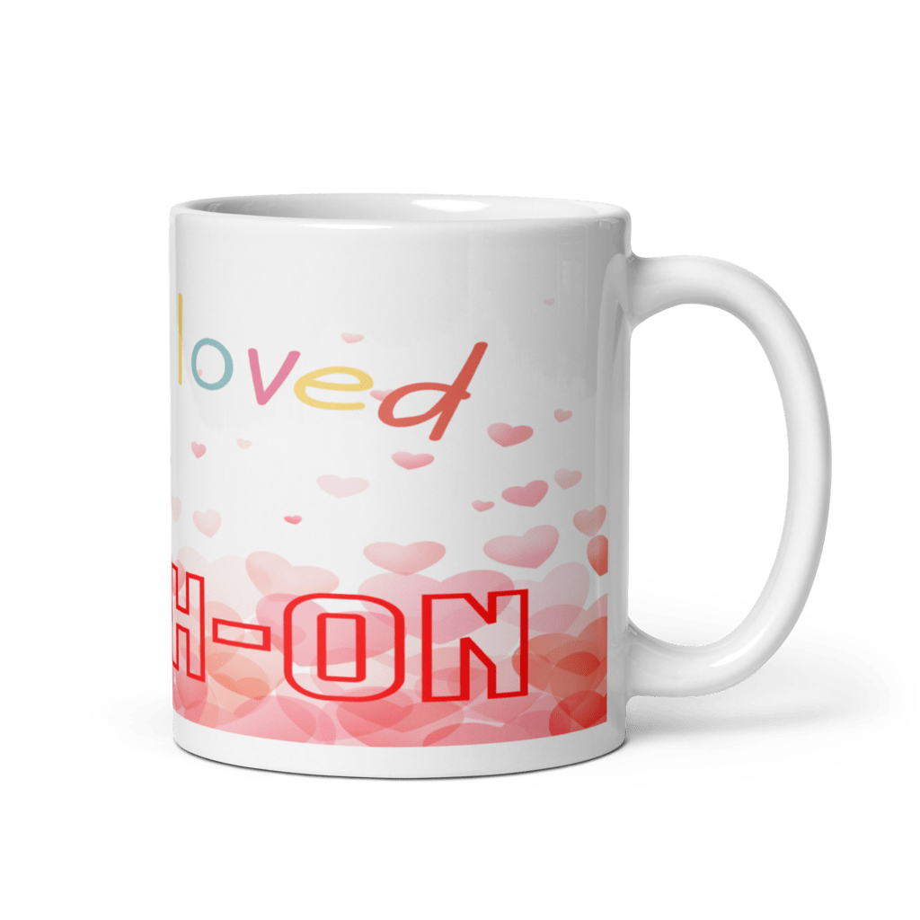 A white ceramic mug with 'I am loved' - faith-based mug