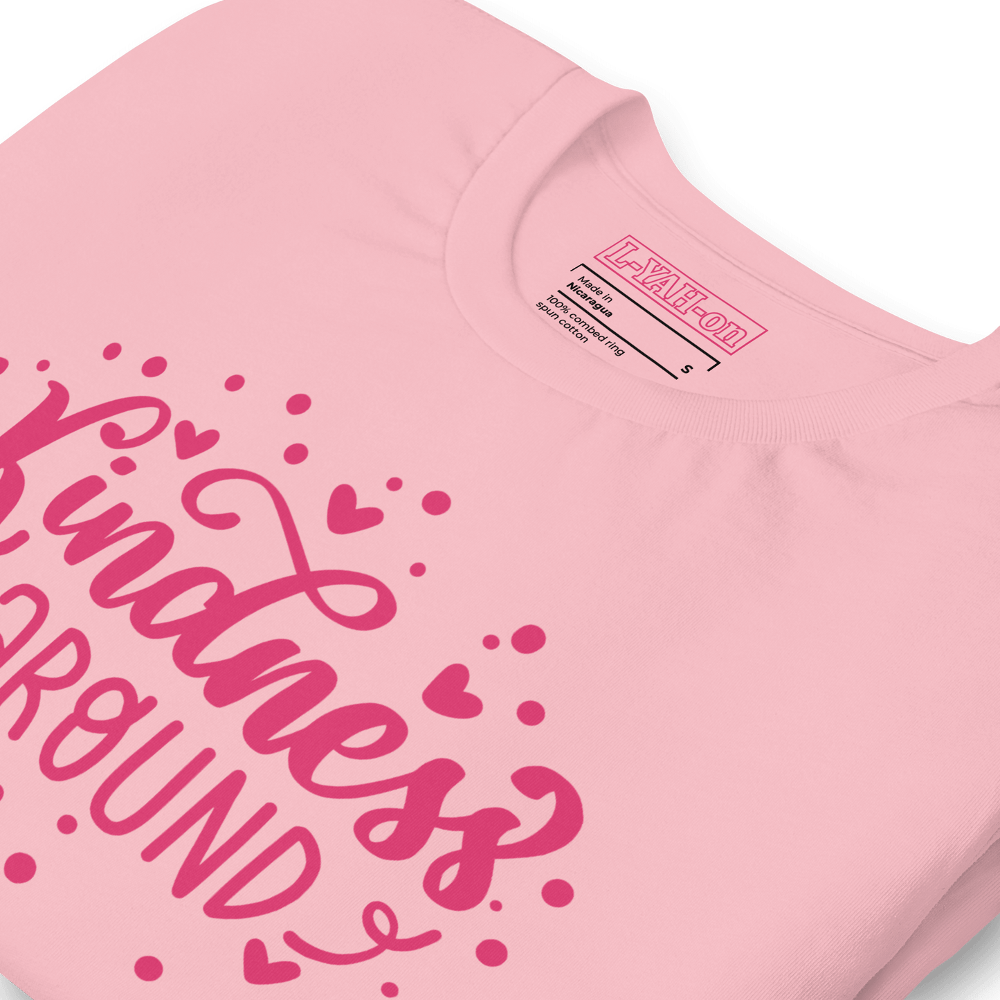 pink t-shirt with the text Kindness around