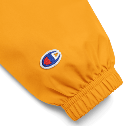 Close-up of a yellow jacket with a brand logo - windbreaker