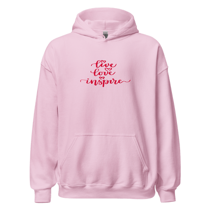 Pink hoodie with 'live love inspire' text on a white background