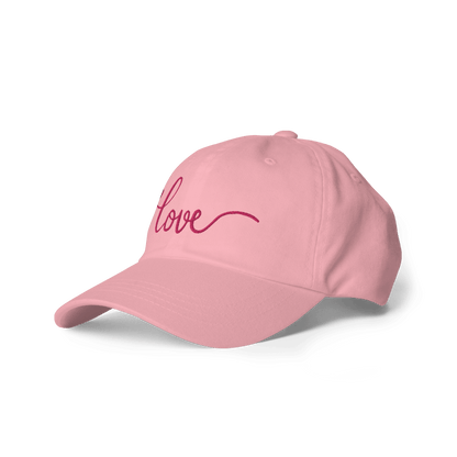 Pink cap with 'love' and a heart embroidered on it