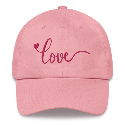 Pink cap with 'love' and a heart embroidered on it