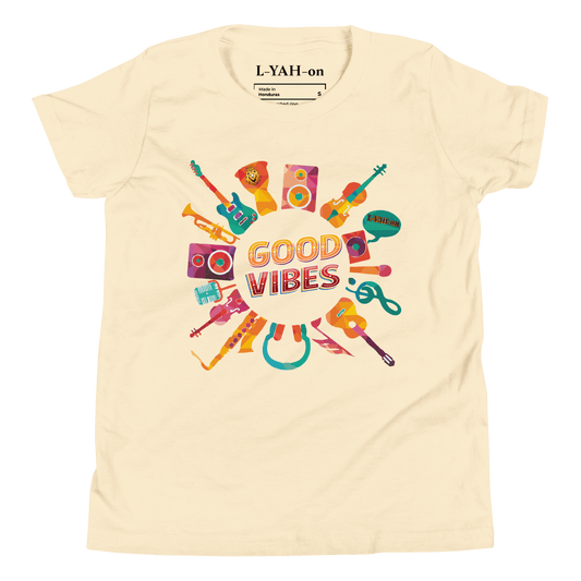 Beige t-shirt with colorful musical instrument graphics and 'Good Vibes' text on a white background