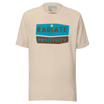 Beige t-shirt with 'Radiate Positivity' text design on a beige background