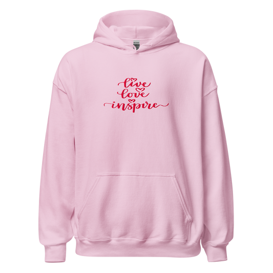 Pink hoodie with 'live love inspire' text on a white background