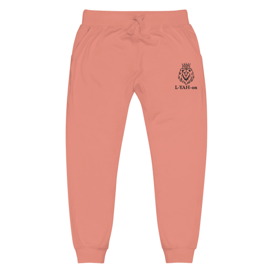 A pair of pink embroidered sweatpants with a white logo on the left pocket.