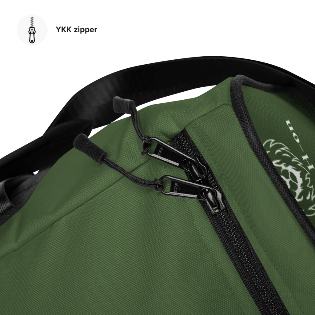 A green duffle bag with a black handle and multiple compartments, featuring a logo on the side.