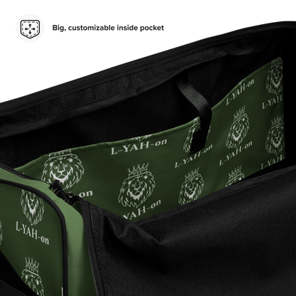 A green duffle bag with a black handle and multiple compartments, featuring logos inside.