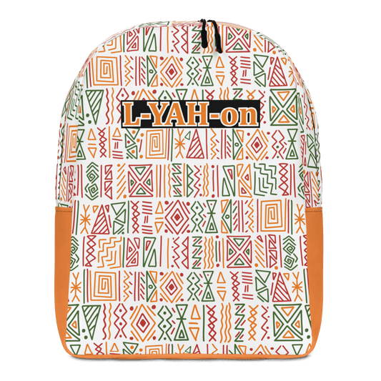 A minimalist backpack with an African print design, featuring a white background with geometric patterns