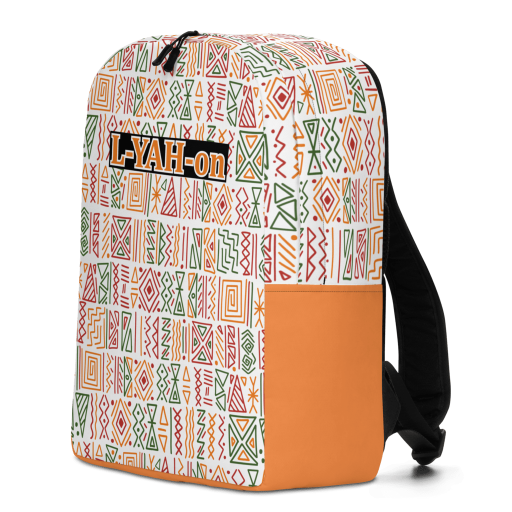 A minimalist backpack with an African print design, featuring a white background with geometric patterns