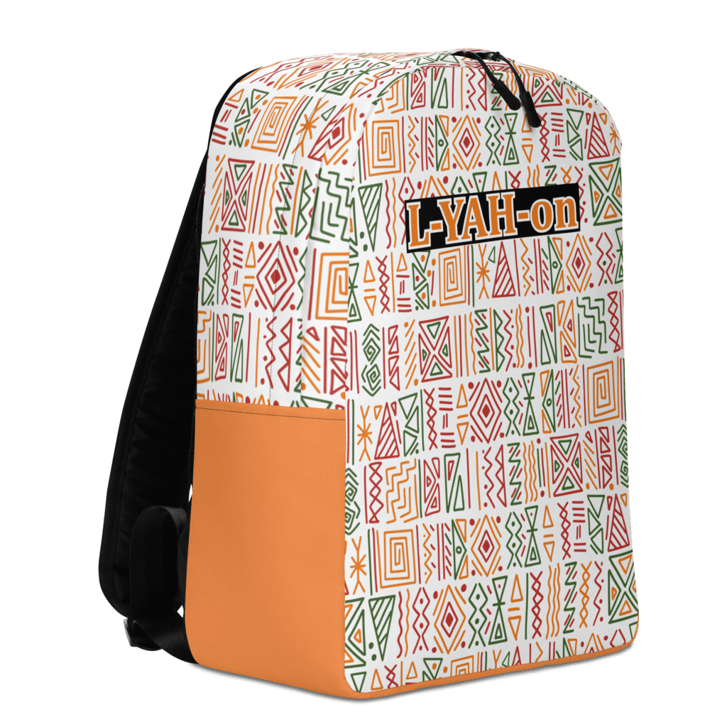 A minimalist backpack with an African print design, featuring a white background with geometric patterns