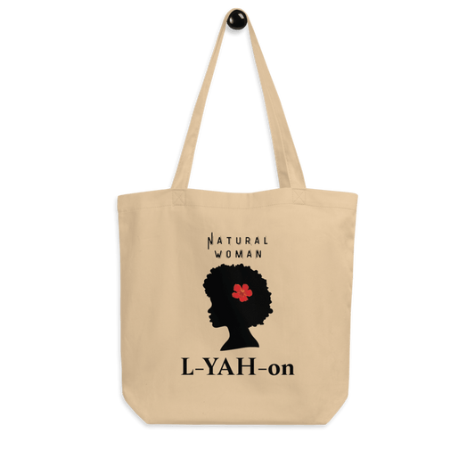 A beige organic cotton tote bag with a graphic print of a woman's silhouette and the brand name 'L-YAH-on'.