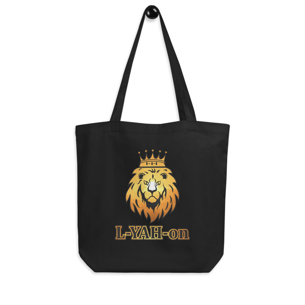 A black organic cotton tote bag with a graphic print of a lion's head wearing a crown and the brand name 'L-YAH-on' on the front.