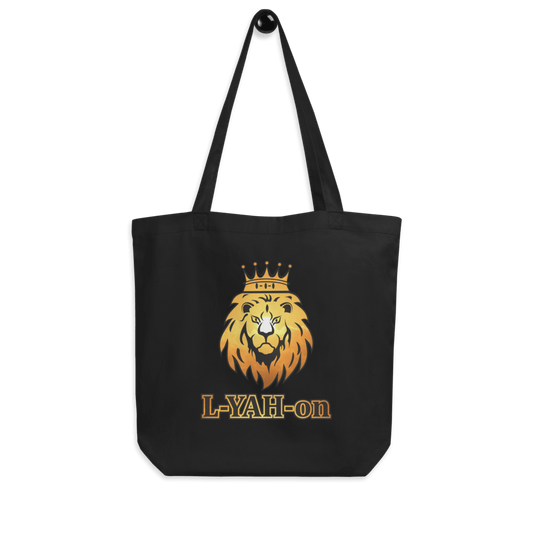 A black organic cotton tote bag with a graphic print of a lion's head wearing a crown and the brand name 'L-YAH-on' on the front.