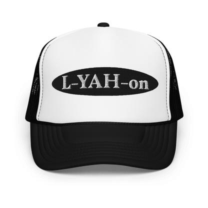 A white foam trucker hat with a black 'L-YAH-on' logo on the front.