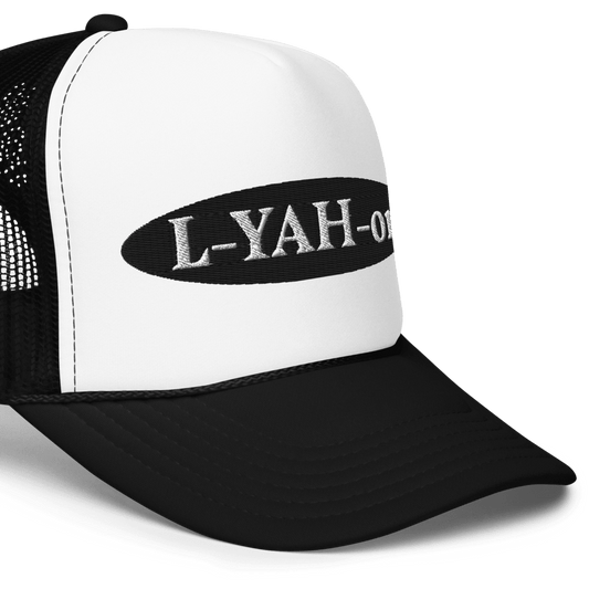 A white foam trucker hat with a black 'L-YAH-on' logo on the front.