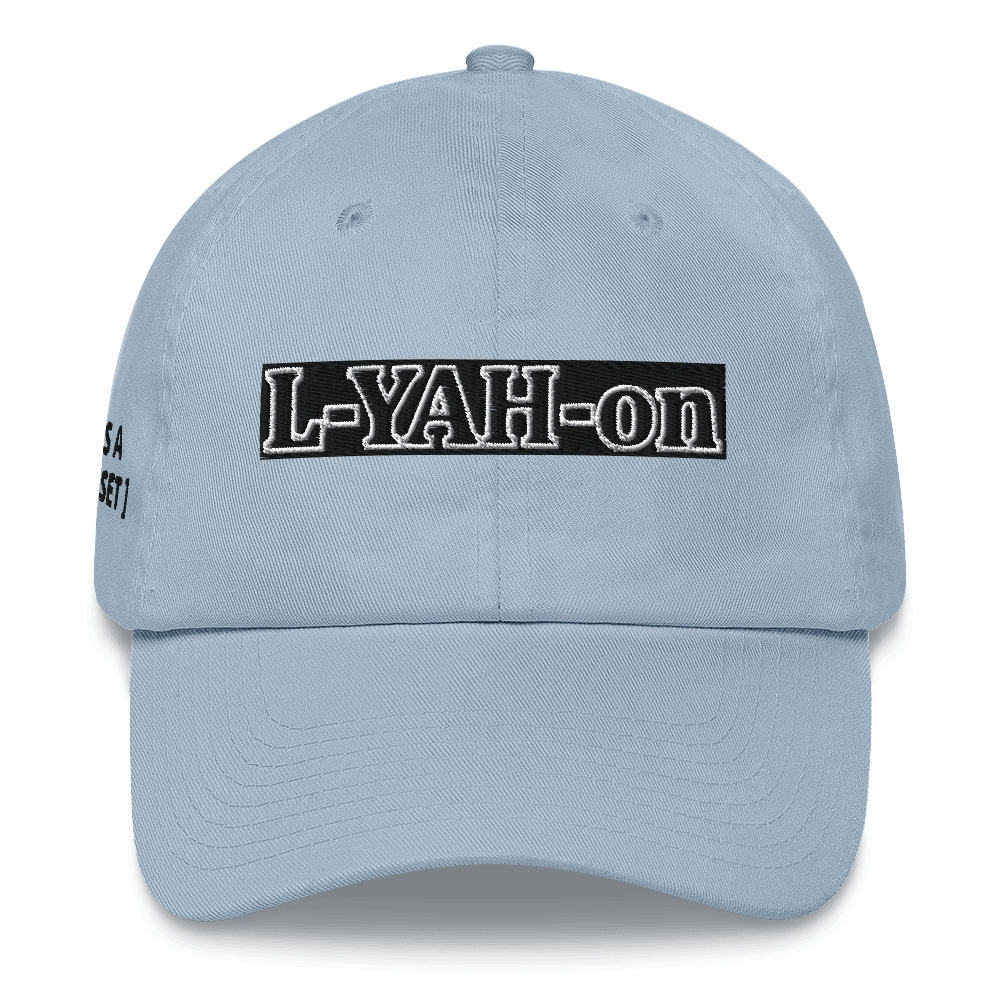 A white baseball cap with the text 'L-YAH-on' - classic dad hat - YHWH accessories
