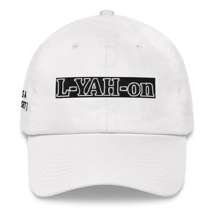 A white baseball cap with the text 'L-YAH-on' -  classic dad hat - YHWH accessories