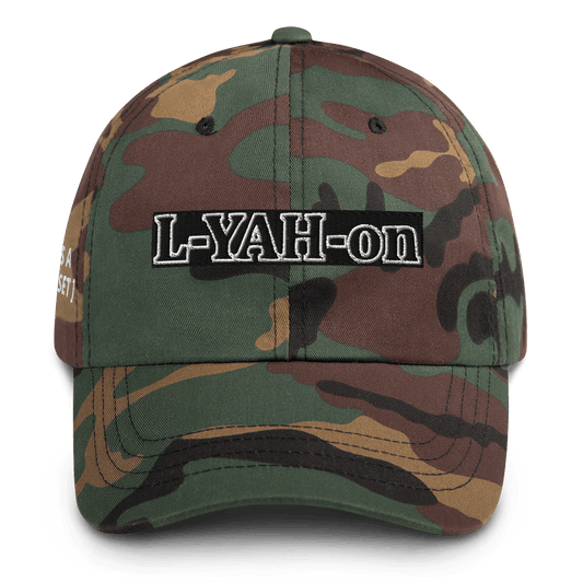 A camouflage framed dad hat with the text 'L-YAH-on' printed on the front.