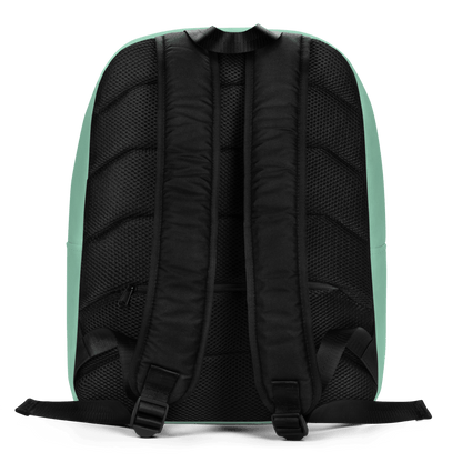 Back of a multicolored backpack with a tropical leaf pattern, 